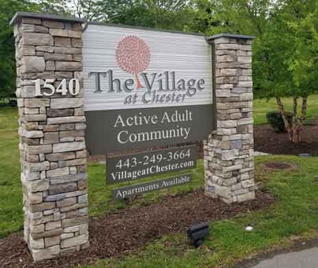 Entrance sign The Village at Chester